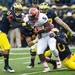 Michigan defense tackles Illinois running back Donovonn Young in the first half on Saturday. Michigan leads 17-0 at halftime. Daniel Brenner I AnnArbor.com